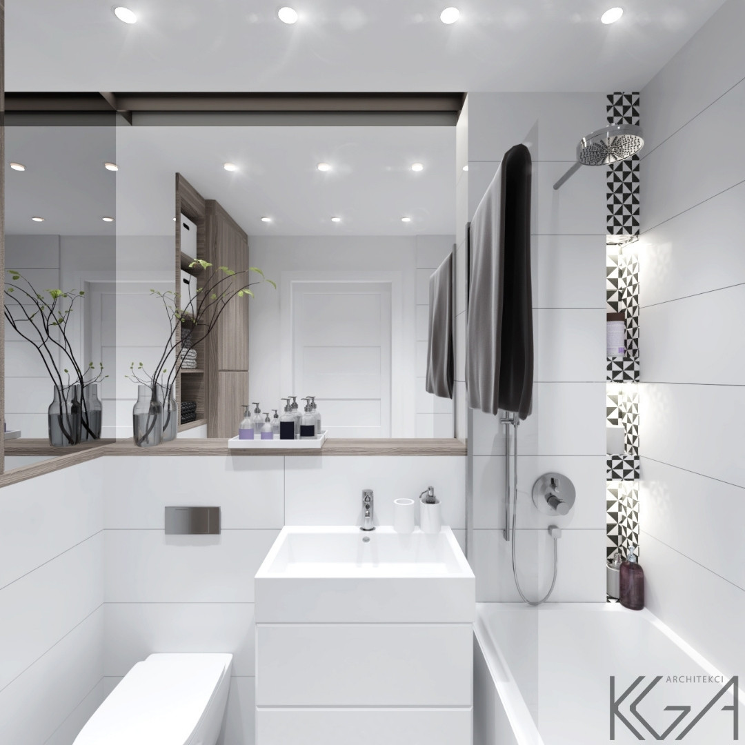 Optycznie powiększona przestrzeń za pomocą dużego lustra w łazience - fot. KGA Architekci 